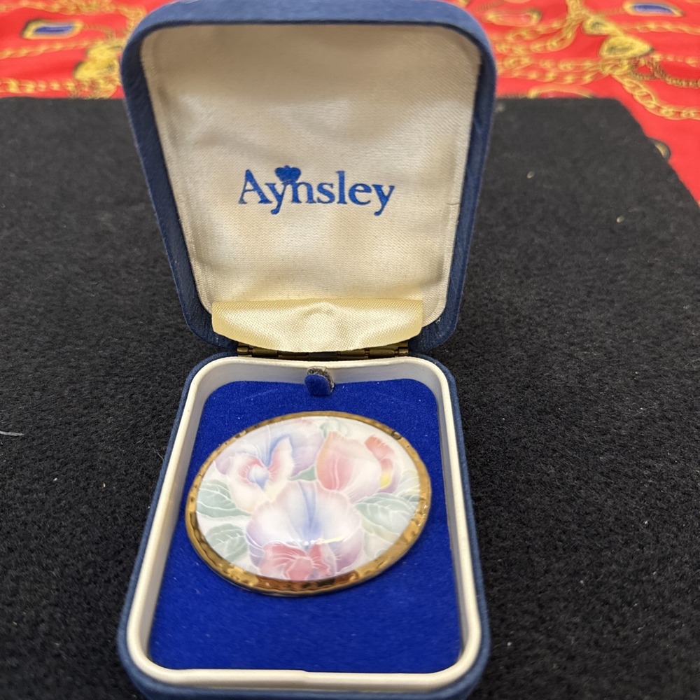 Aynsley fine English bone china floral design brooch in a gold-gilt oval setting